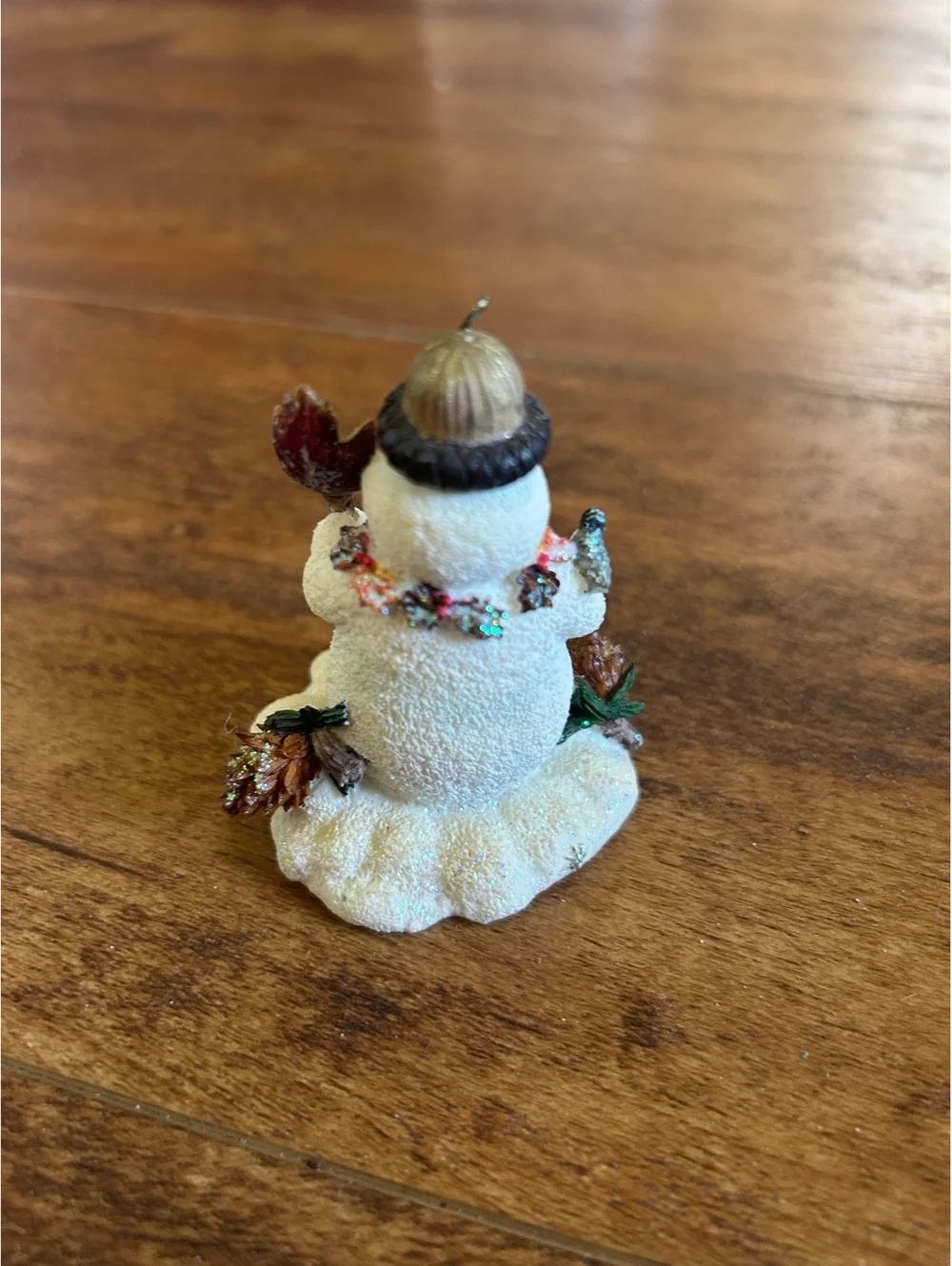 Small Decorative Snowman Figurine with Acorn Hat and Leaf Staff